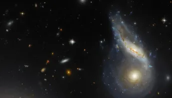 Hubble revela duas galáxias em processo de colisão